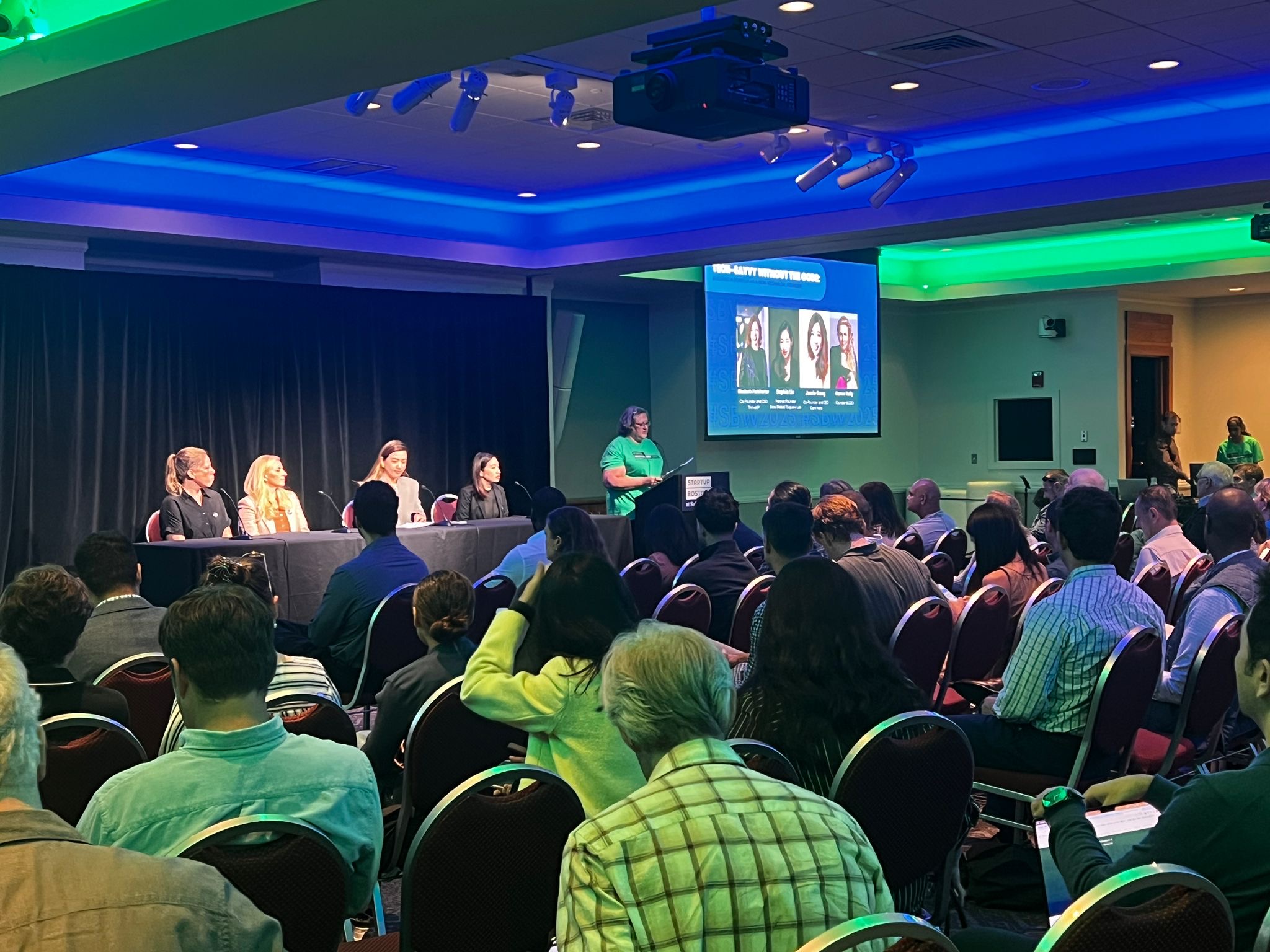 Sophia Lin speaking at Startup Boston Week 2025 — packed room at the Tech-Savvy Without the Code panel